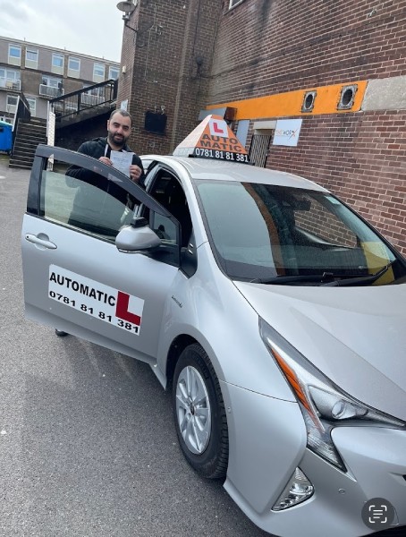 Happy student after passing driving test 11